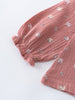 Pink textured fabric with small animal prints on a white background Ruffle Woven Blouse - Bird And Blossom Rosehip Girls