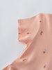 Close-up of peach fabric with small ice cream cone print pattern Short Sleeve Dress - Ice Creams Girls