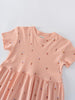 Close-up of a peach-colored dress with small ice cream cone print Short Sleeve Dress - Ice Creams Girls