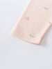 Close-up of pale pink fabric with small peach apple print pattern Stella Leggings - Apples Baby girl