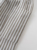 Close-up of striped fabric with vertical brown and white stripes Striped Pants - Matcha Stripe Boys