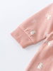 Close-up of pink fabric sleeve with embroidered rabbits and ribbed cuff Baby Sweatshirt Dress - Meadow Friends Blush Baby girl
