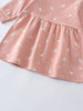 Close-up of pink fabric with white bunny pattern and gathered skirt detail Baby Sweatshirt Dress - Meadow Friends Blush Baby girl