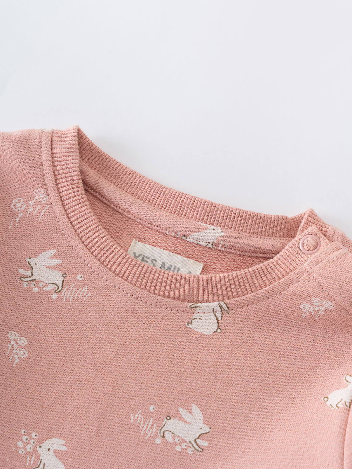 Close-up of pink ribbed neckline with white embroidered rabbit pattern Baby Sweatshirt Dress - Meadow Friends Blush Baby girl