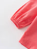 Close-up of coral pink blouse on a light gray background Three Button Blouse - Cloudberry Girls
