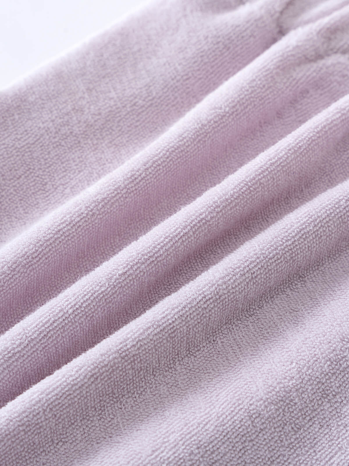 Close-up of soft lilac towelling fabric with gentle folds and texture Towelling Shorts - Lilac Girls