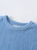 Close-up of a light blue textured fabric shirt neckline Towelling Tee Shirt - Sky Blue Boys