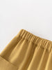 Close-up of mustard yellow pants with an elastic waistband on a light gray background Twill Pants - Golden Pear Boys