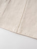 Close-up of cream-colored twill fabric with diagonal stitching detail Twill Pinafore Dress - Salt Girls