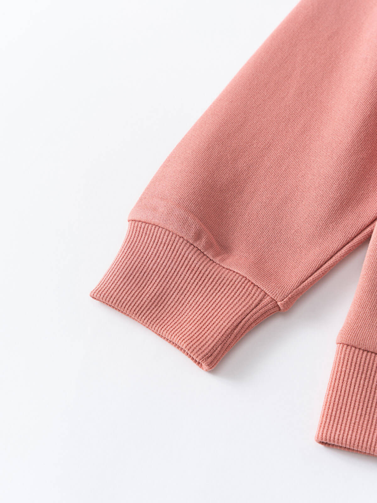 Close-up of pink ribbed cuffs on a sweatshirt sleeve Zip Hoodie - Rosehip Boys