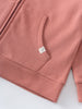 Close-up of a pink hoodie pocket with ribbed hem detail Zip Hoodie - Rosehip Boys